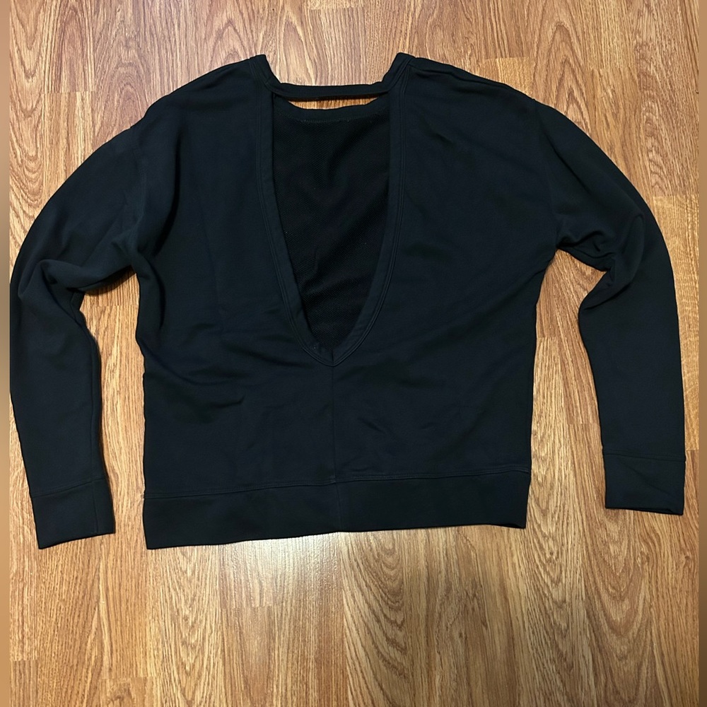 Black Nike sweater with back out